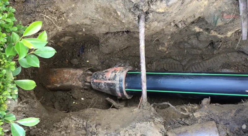 Damaged sewer pipe excavated Simpsonville SC Rocky Creek corridor replacement